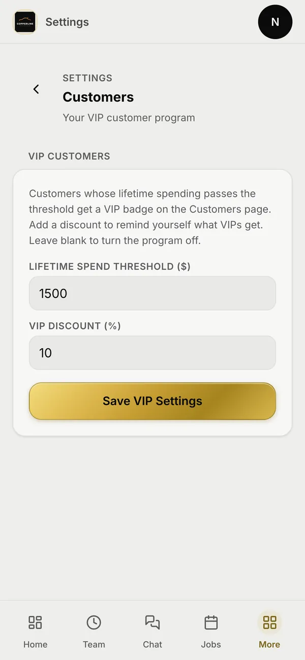 The VIP program settings on a phone: the lifetime spend that makes a customer a VIP, and a discount noted as a reminder of what VIPs get.